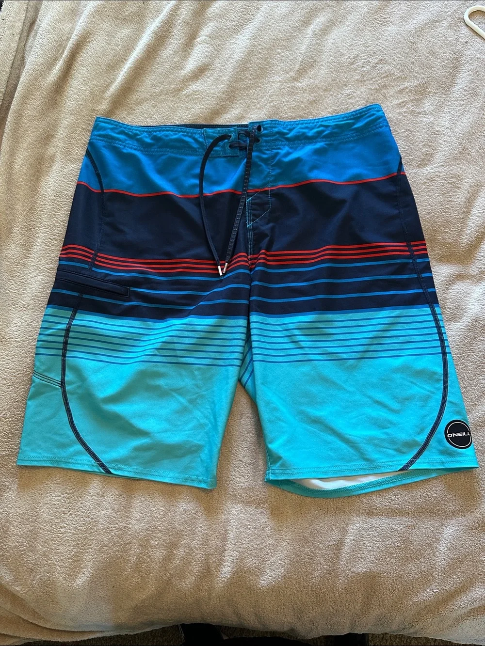 O'Neill Men's Aqua & Navy Striped Board Shorts with Red Accent